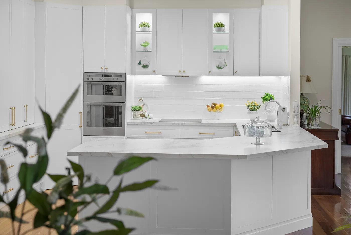 White shaker kitchen with marble island at Frank Street