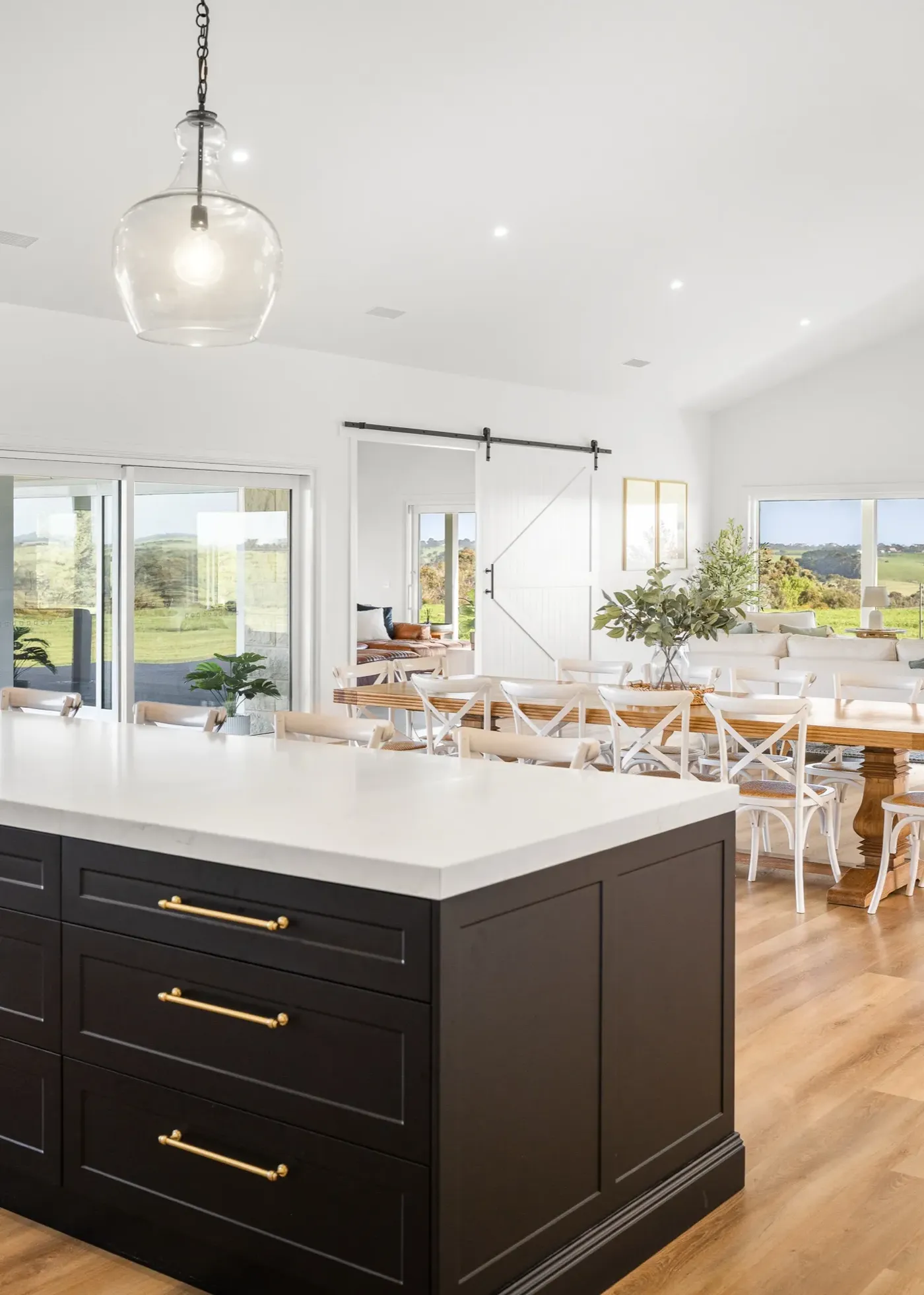 Kitchen with island and shaker cabinetry