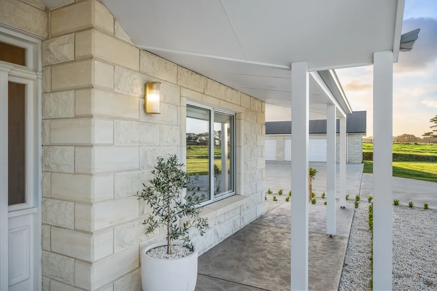 Limestone facade detail on an Atwell Built home